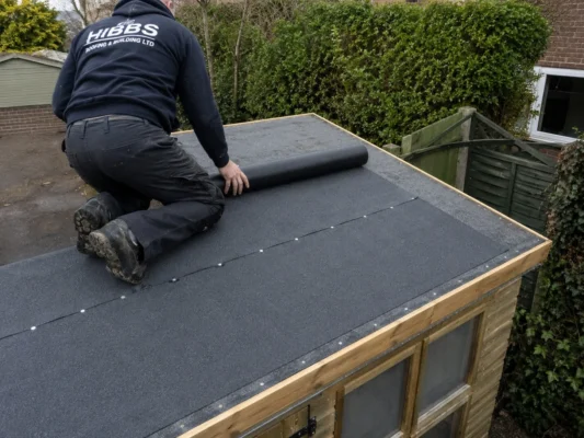 Roofer in Ashford Installing Shed Roof Felt